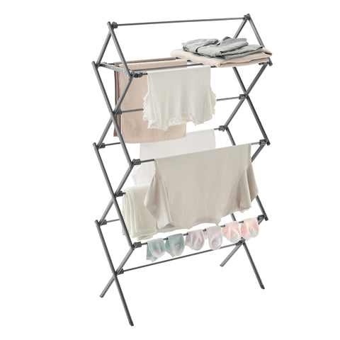 Songmics foldable drying rack assembled for indoor use with a sturdy steel frame.