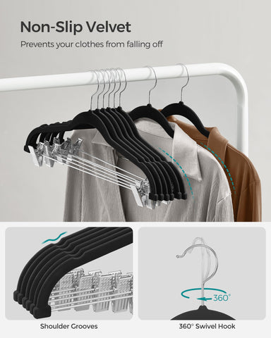 Heavy-duty black hangers designed for coats, dresses, and larger garments.