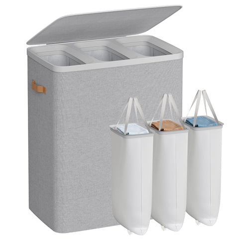 Songmics three-compartment laundry basket for easy clothing sorting.