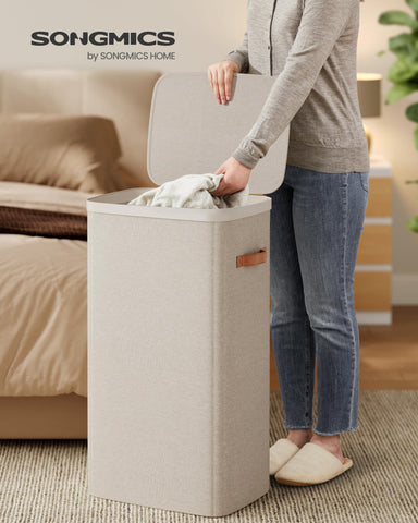 SONGMICS laundry basket with easy-assembly setup and sturdy inner liner.