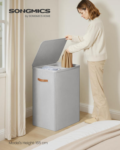 Songmics laundry basket side view showing sturdy frame and lid