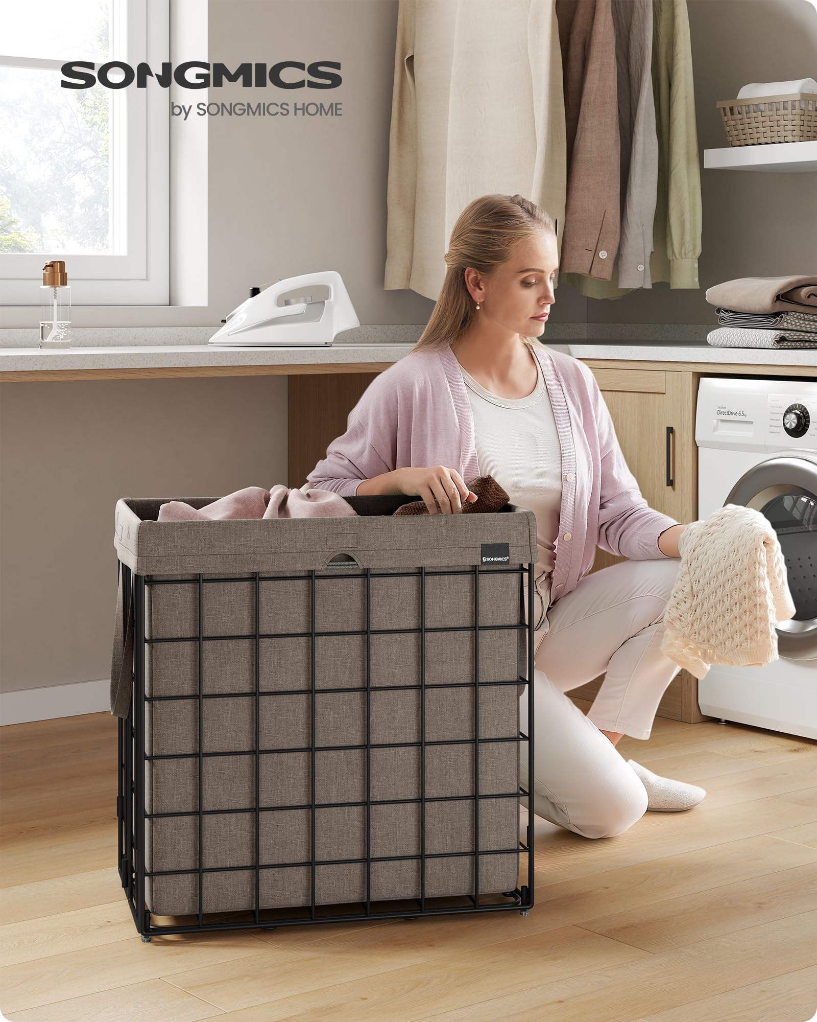 SONGMICS laundry hamper side view demonstrating collapsible design for space-saving storage.