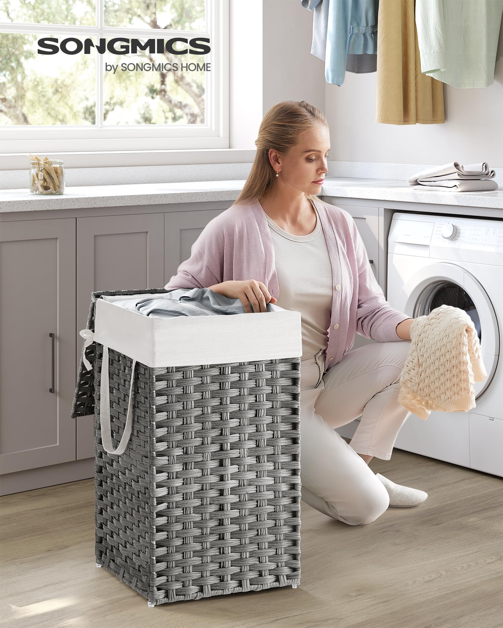 SONGMICS laundry hamper lid opens with one hand for quick access.