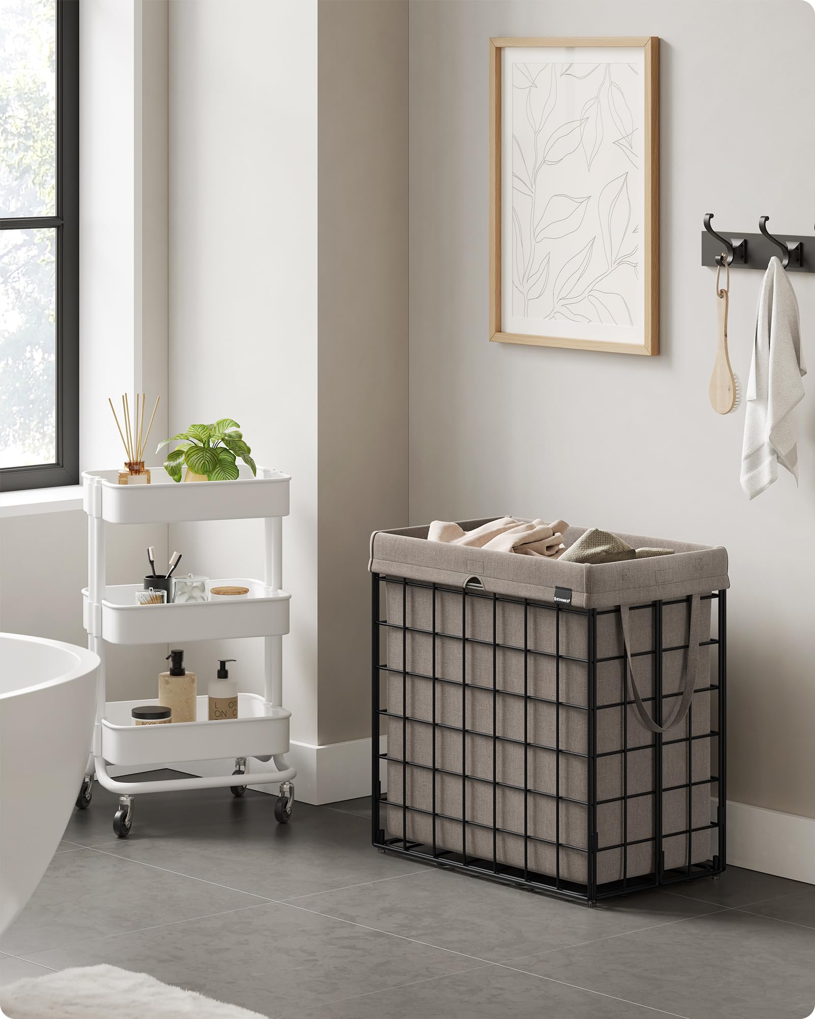 SONGMICS laundry hamper removable liner close-up highlighting easy removal and machine washable fabric.