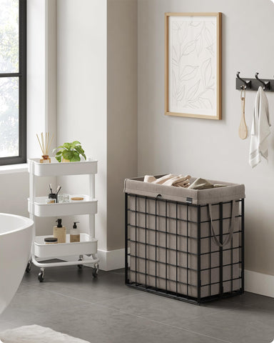 SONGMICS laundry hamper removable liner close-up highlighting easy removal and machine washable fabric.