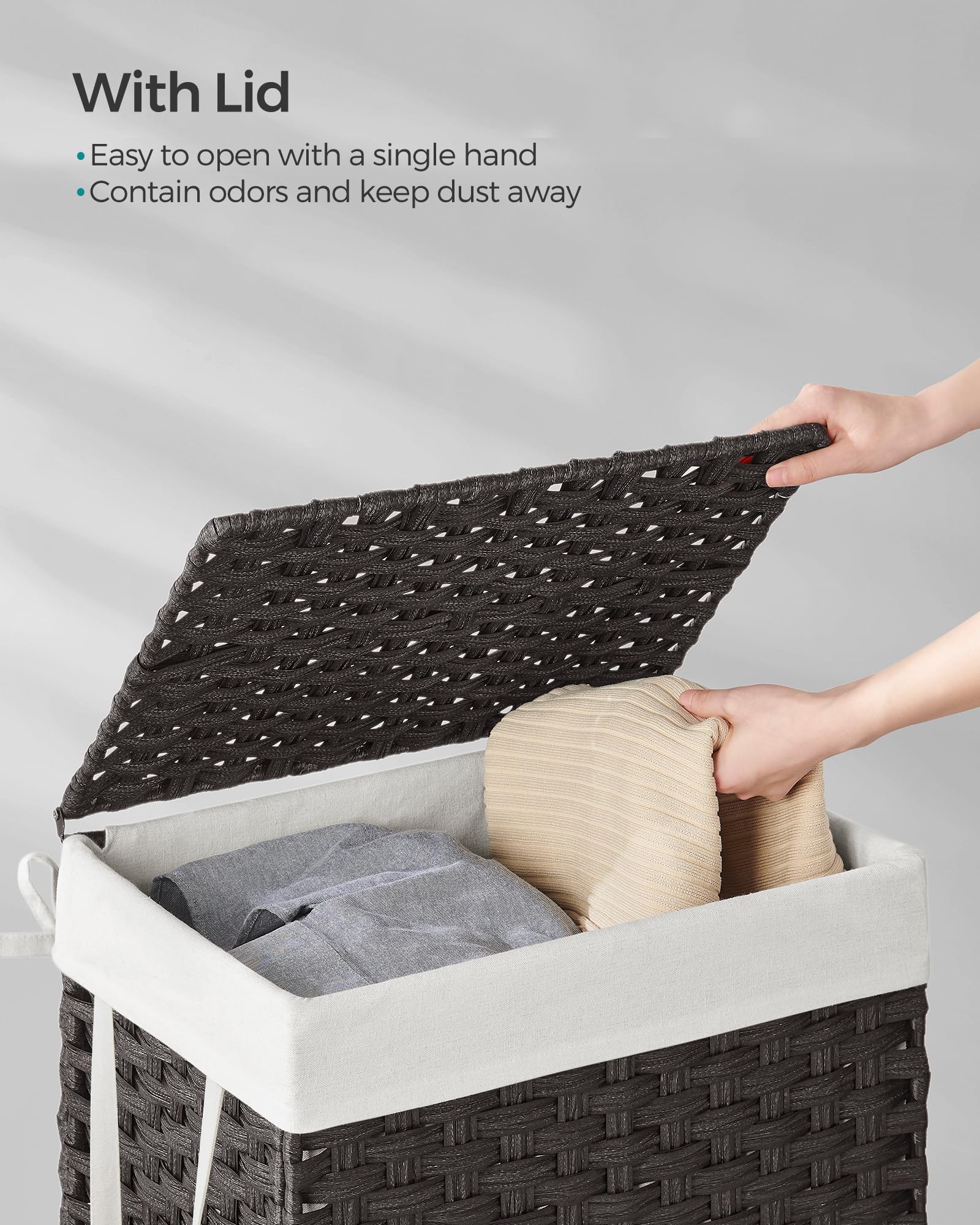 Removable liner with handles from SONGMICS hamper ready for washing.