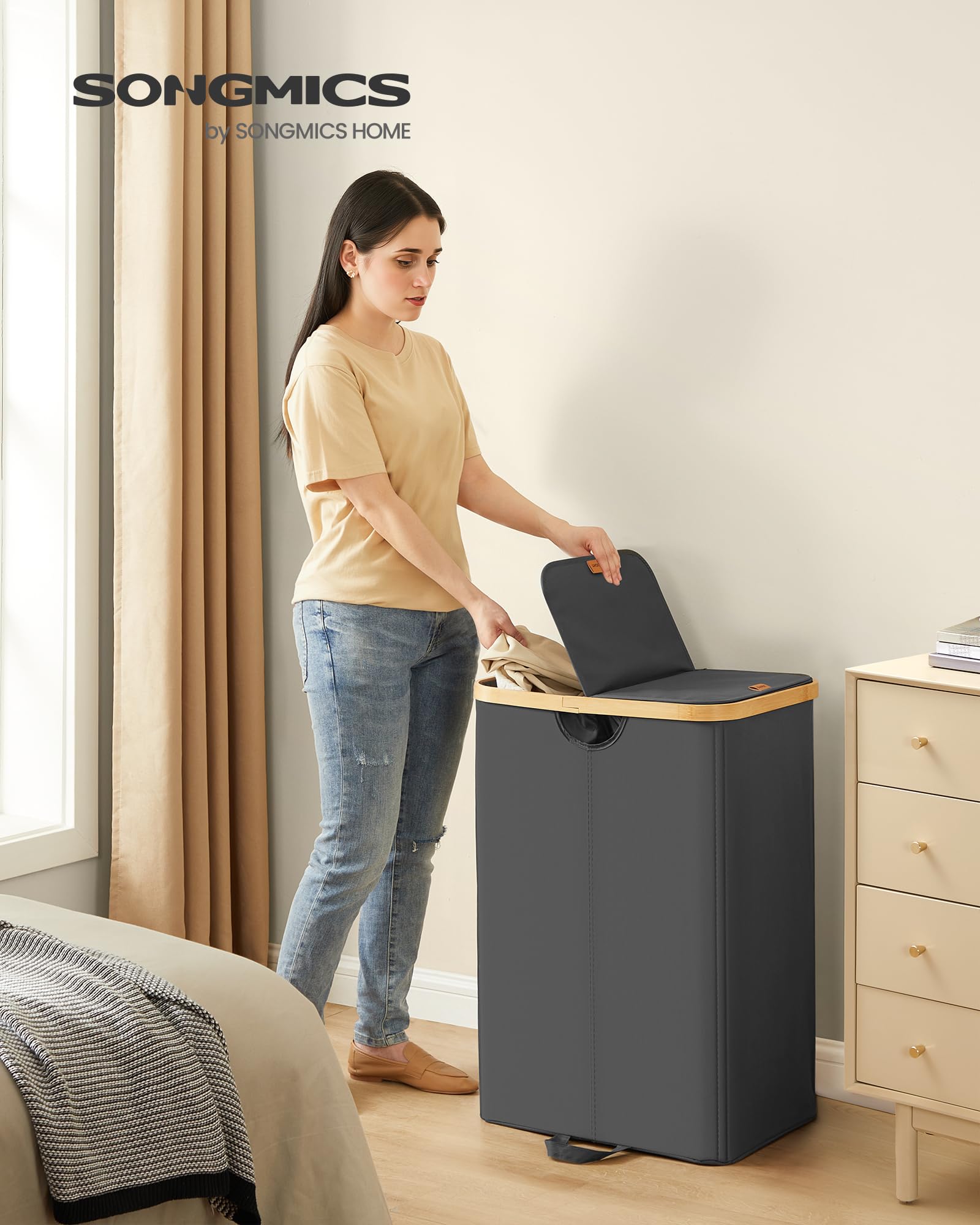 Songmics two-compartment hamper with Light and Dark labels helps sorting clothes.