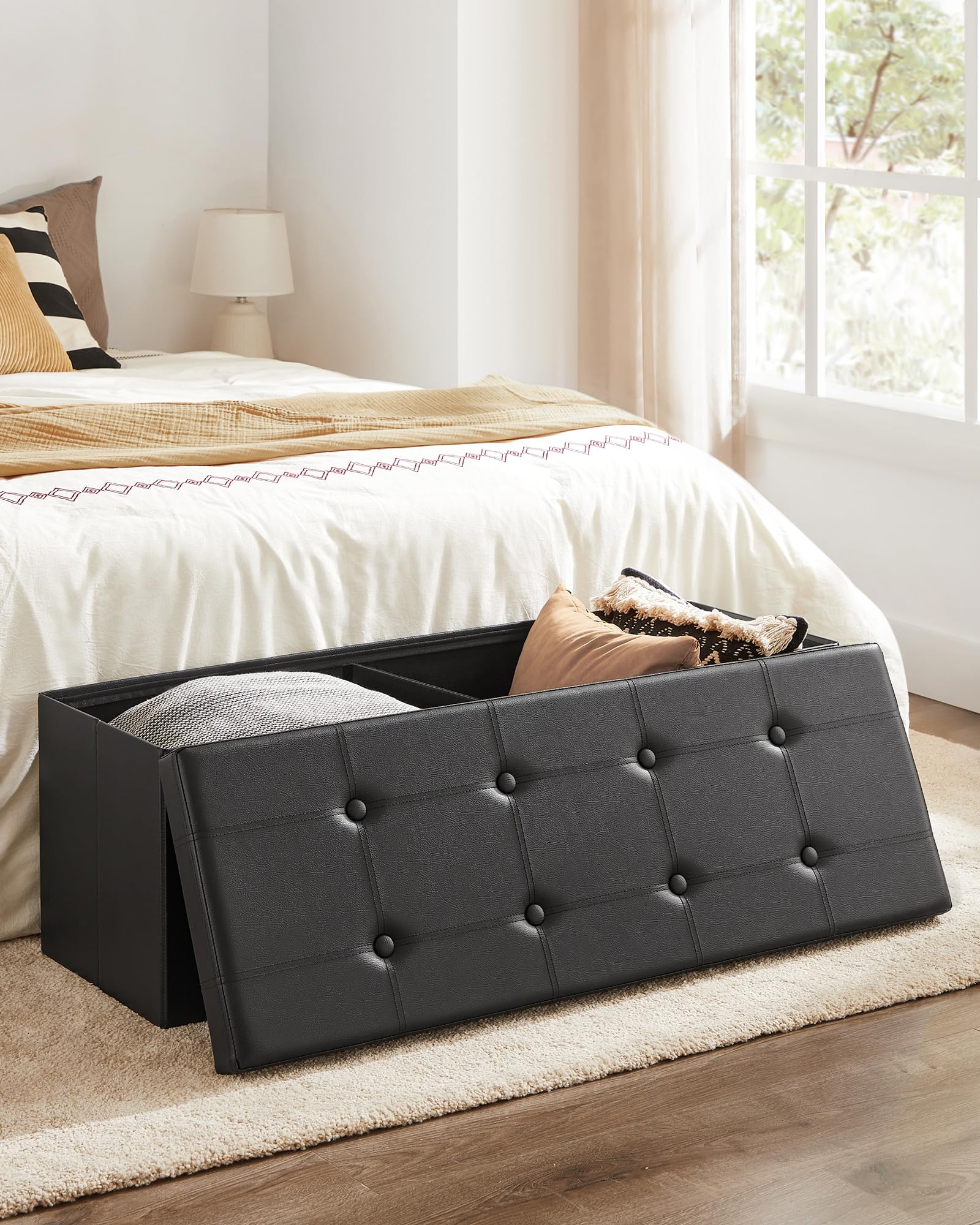 SONGMICS Mazie ottoman with open lid showing 131-liter storage capacity