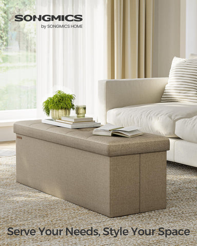 Songmics MAZIE lid with tufting adds elegant surface for display and seating.