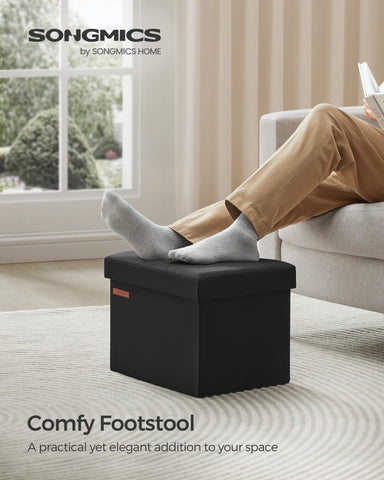 Songmics MAZIE 32L storage ottoman open for organized clothes and magazines.