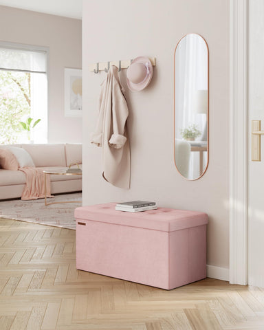 Songmics Mazie ottoman showing 24-gallon capacity and extra storage boxes