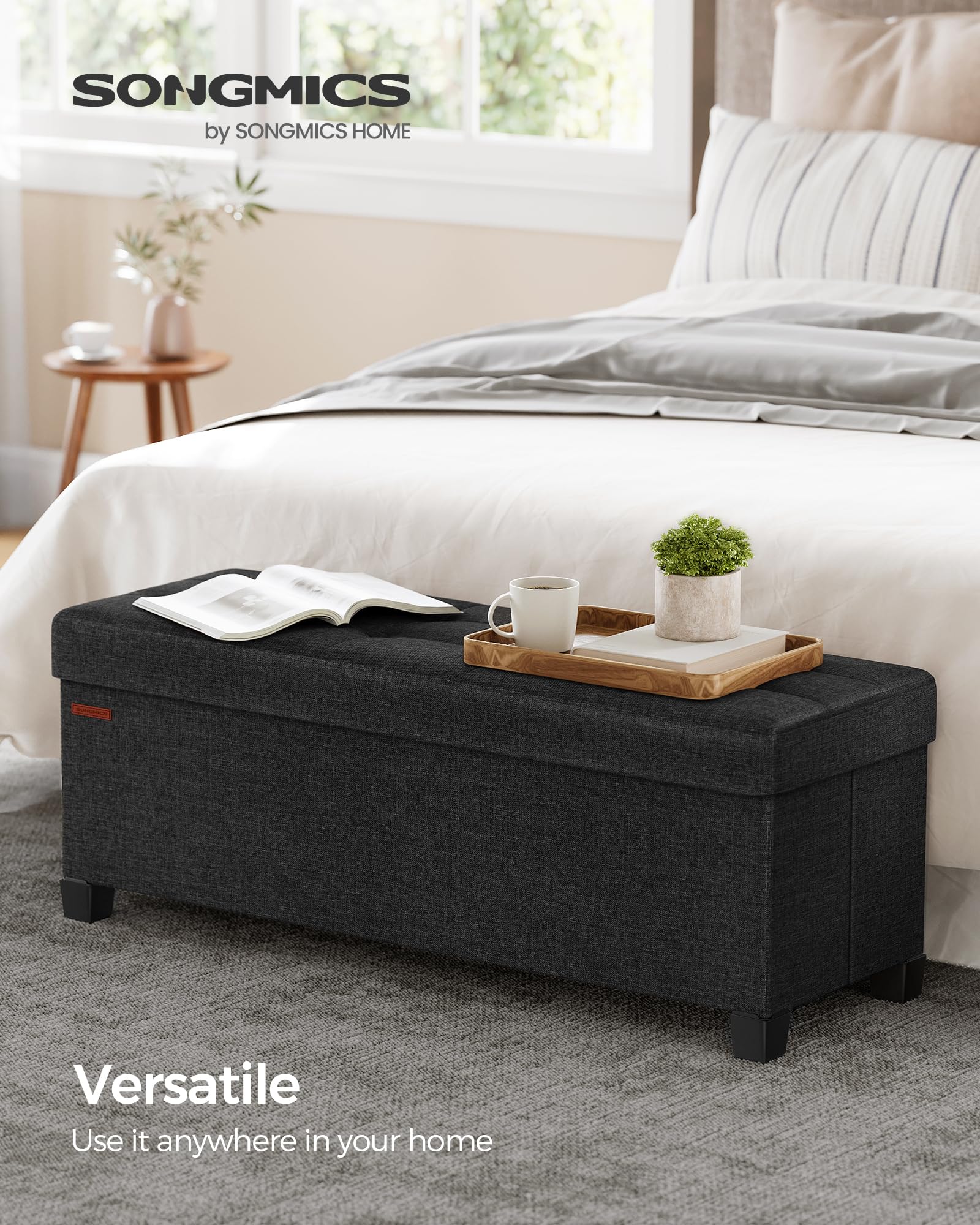 Songmics ottoman bench lid features metal corner guards for durability.