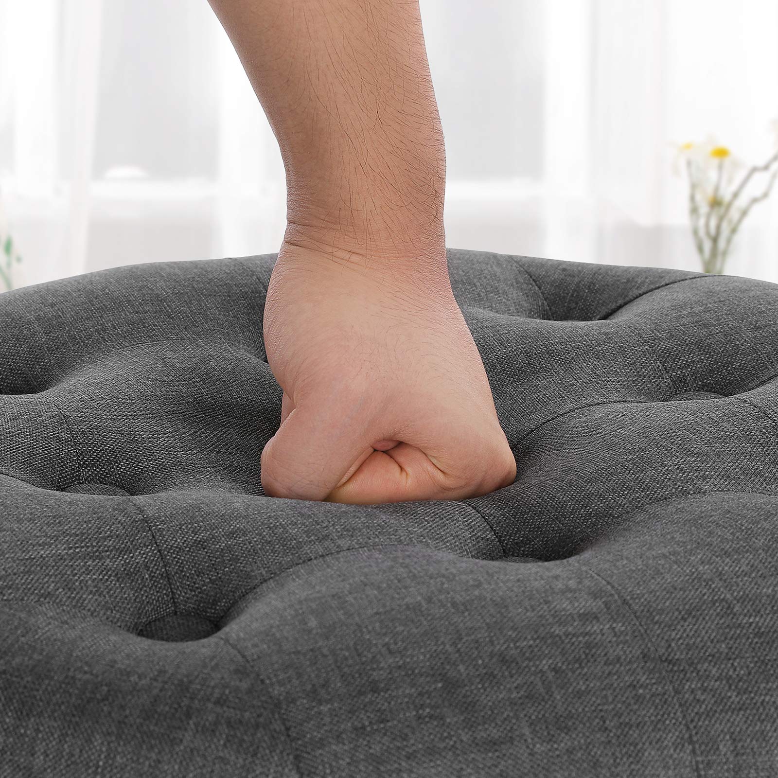SONGMICS round ottoman used as an extra seat during guests