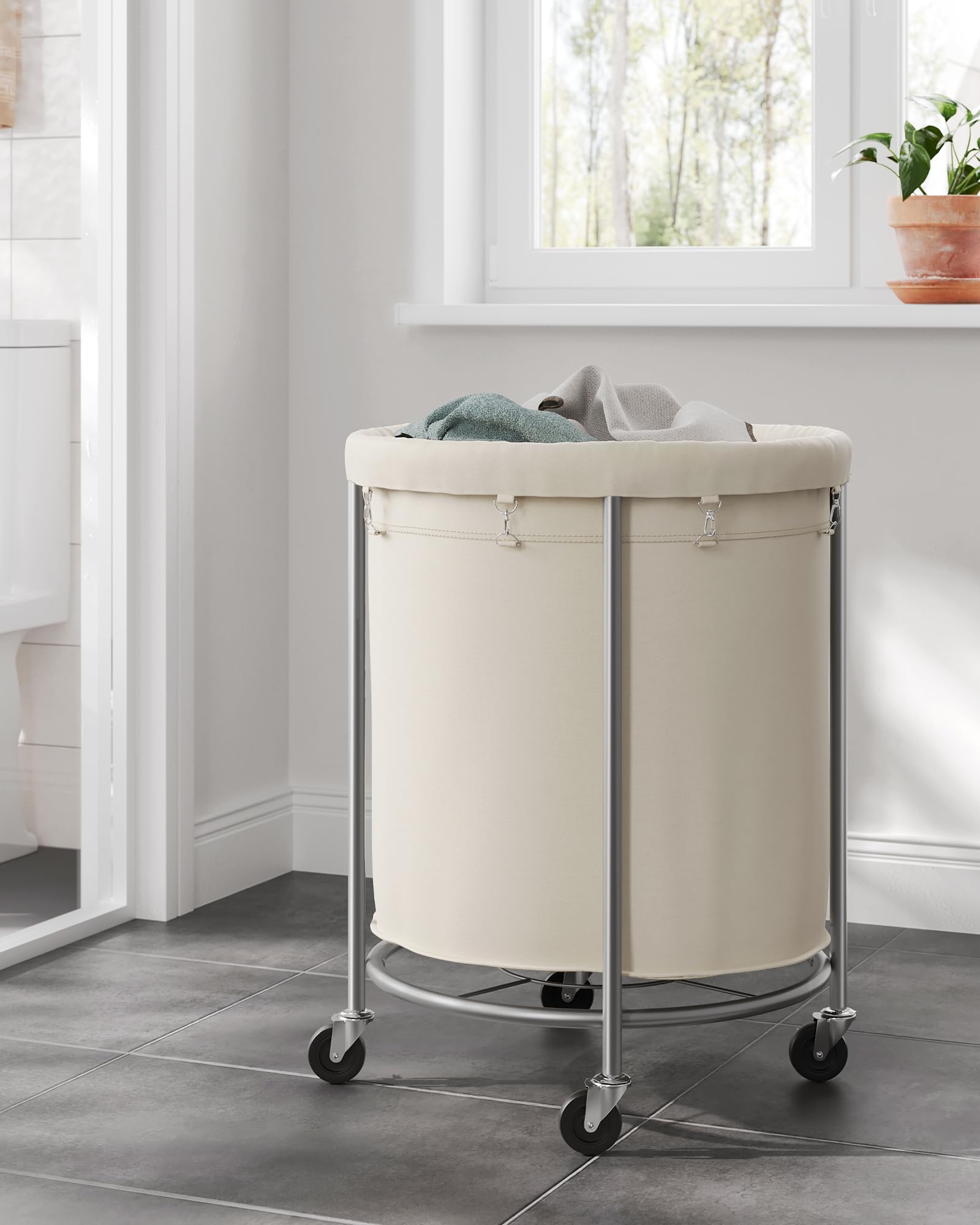 Songmics spacious cart ideal for laundry and linens organization