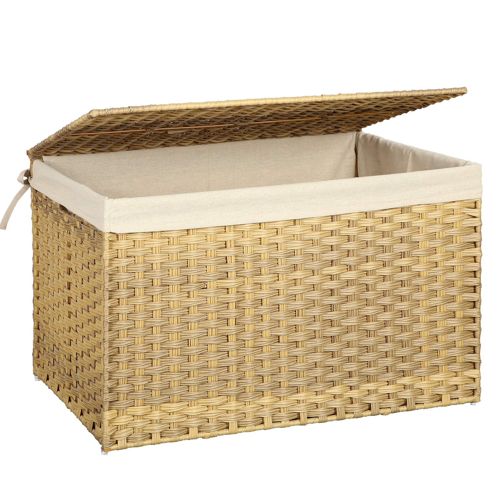 SONGMICS storage basket with lid near bed for dust-free blanket storage.