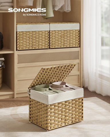 SONGMICS basket with lid and side handles for easy carrying.