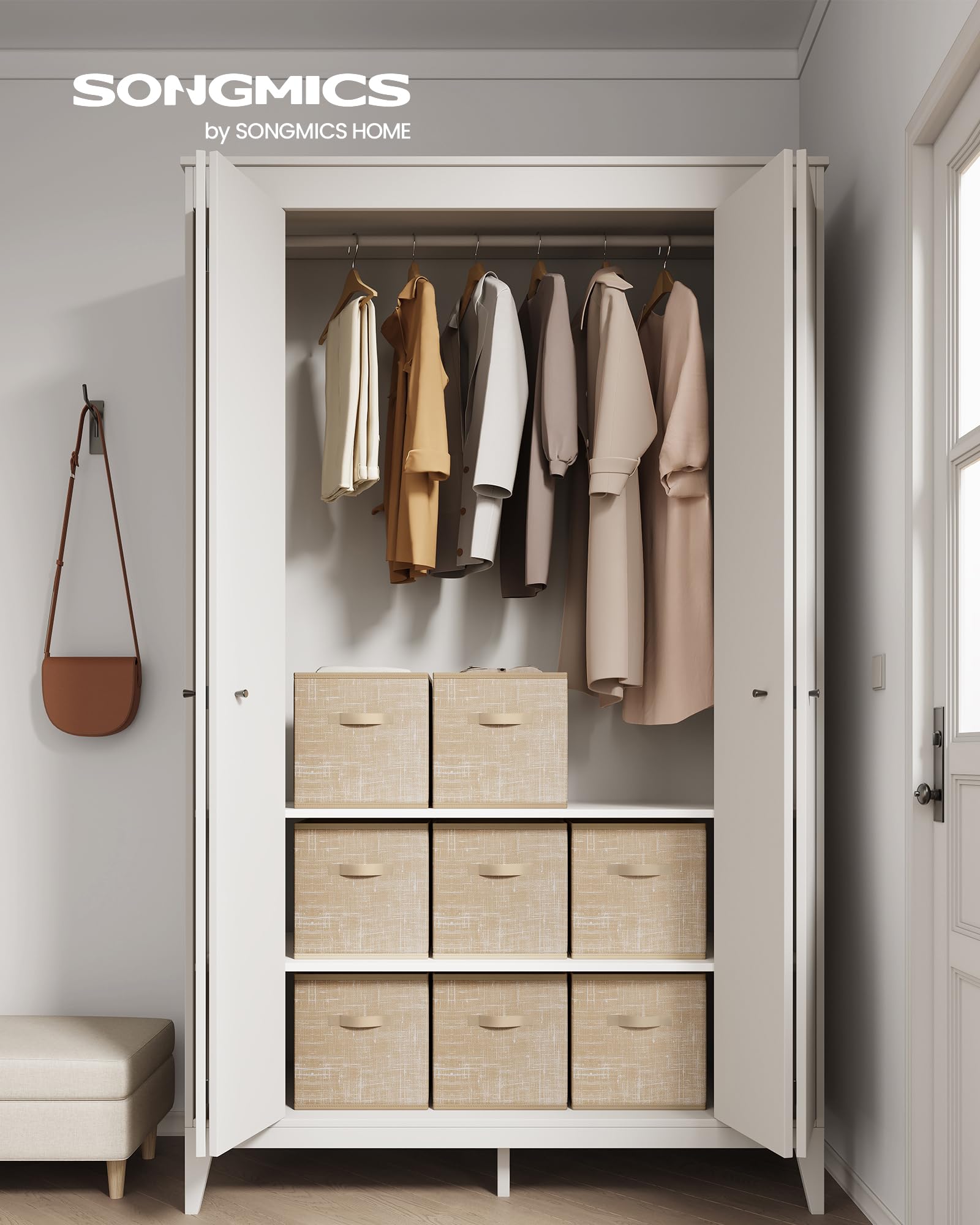 SONGMICS storage cubes with double handles shown being carried