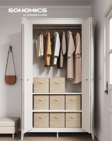 SONGMICS storage cubes with double handles shown being carried