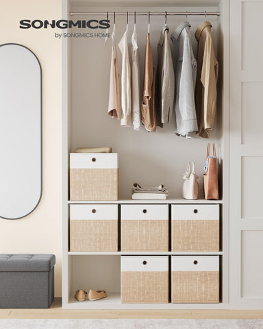 Close-up of handles on SONGMICS cubes for easy sliding on shelves.
