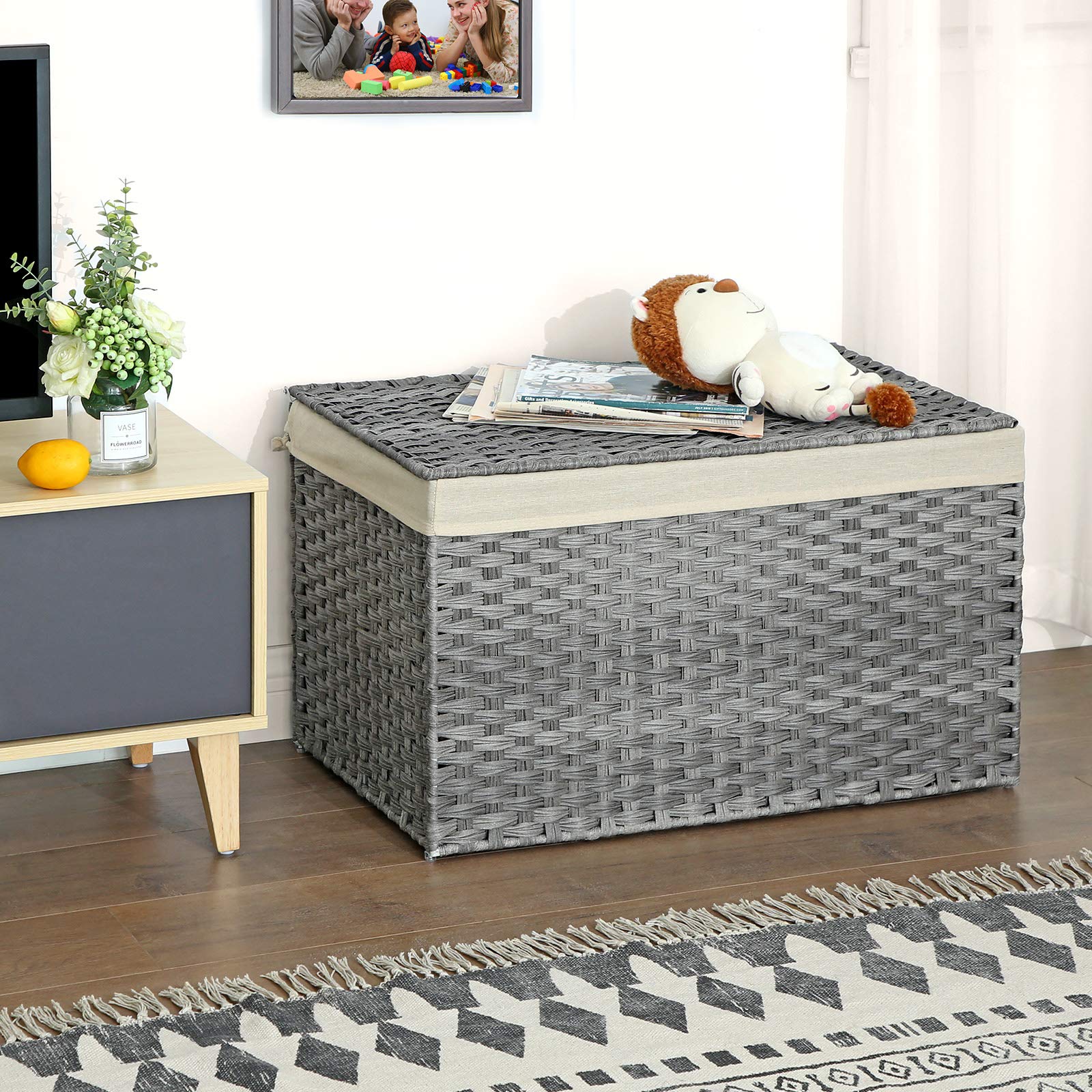 Bedroom or laundry area setup featuring Songmics storage basket for organization