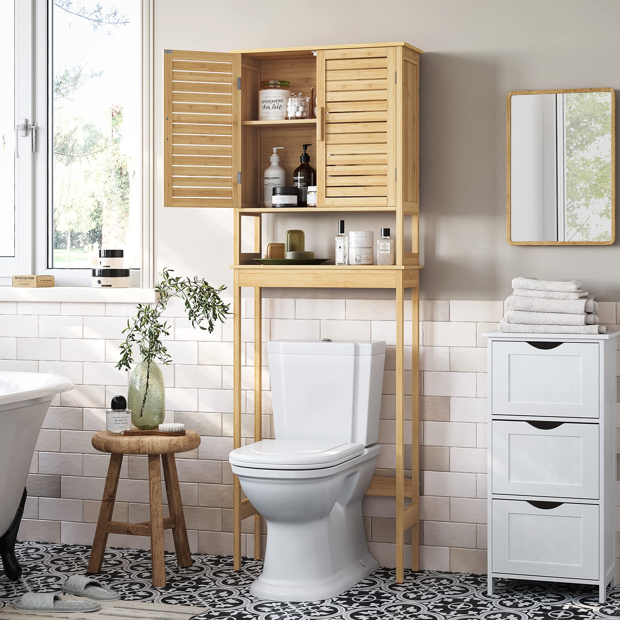 SONGMICS toilet cabinet with two doors keeps daily essentials neatly tucked away.
