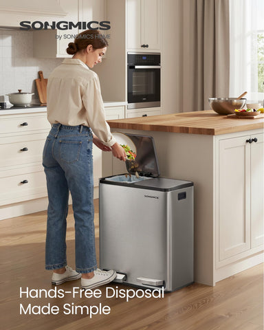 SONGMICS soft-close lid in action for quiet disposal in the kitchen.