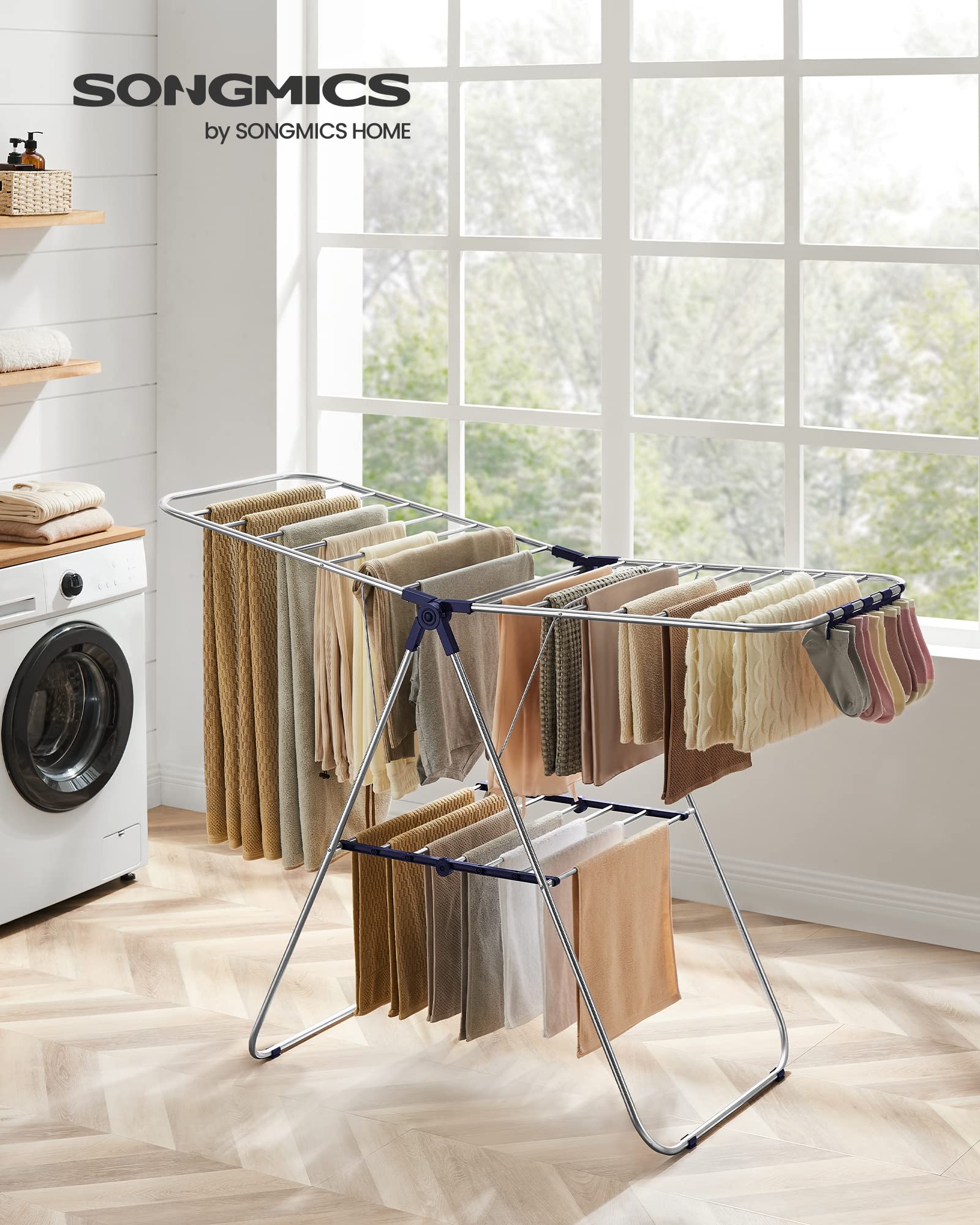 Top wings extended to accommodate long garments and towels on the SONGMICS rack.