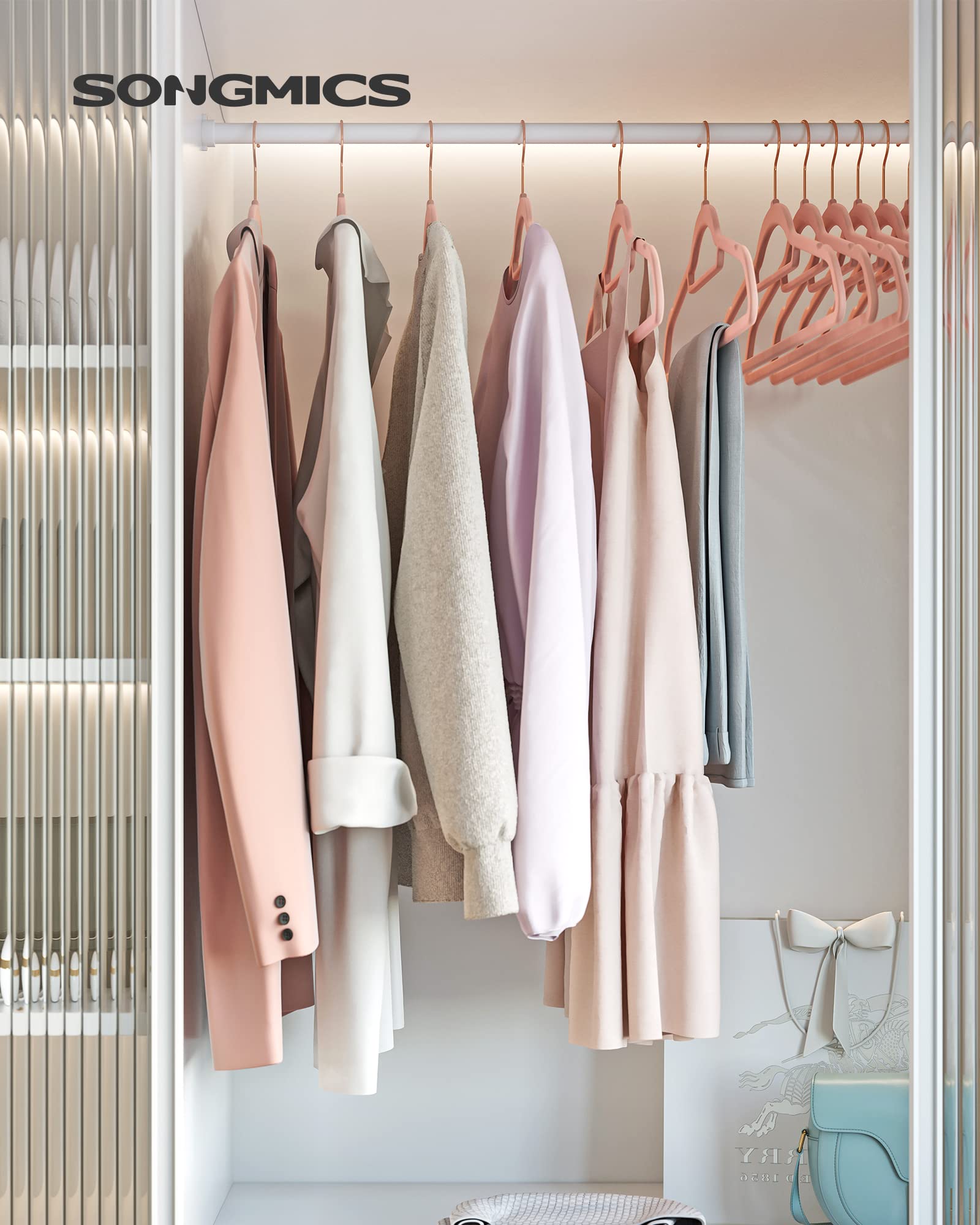Songmics velvet hanger with rose gold swivel hook for easy access.