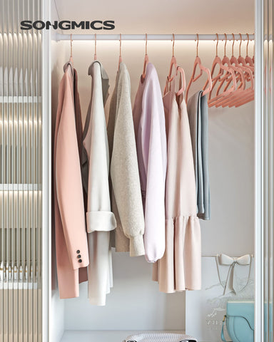 Songmics velvet hanger with rose gold swivel hook for easy access.