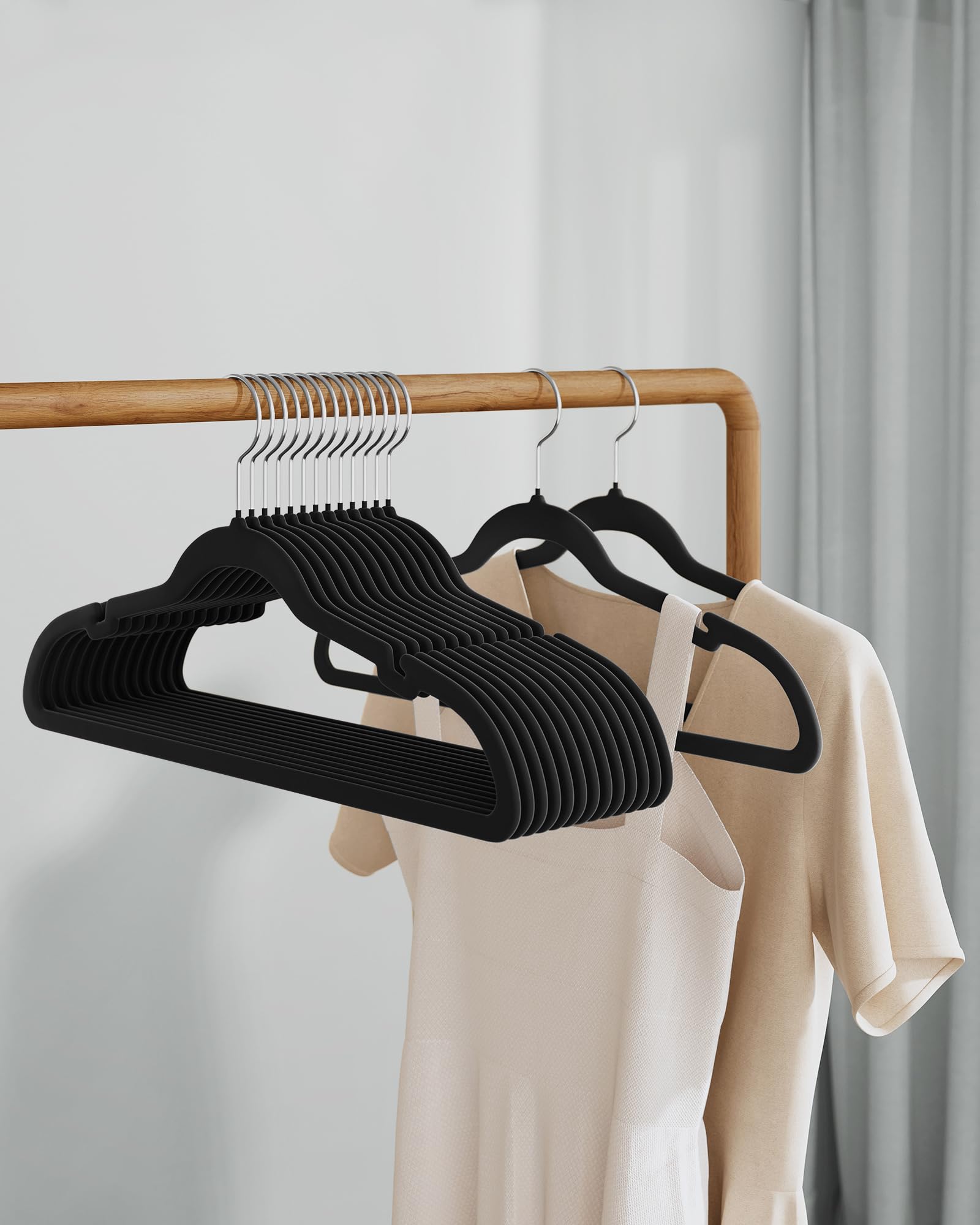 SONGMICS velvet hangers ink-black finish adds sleek closet style.