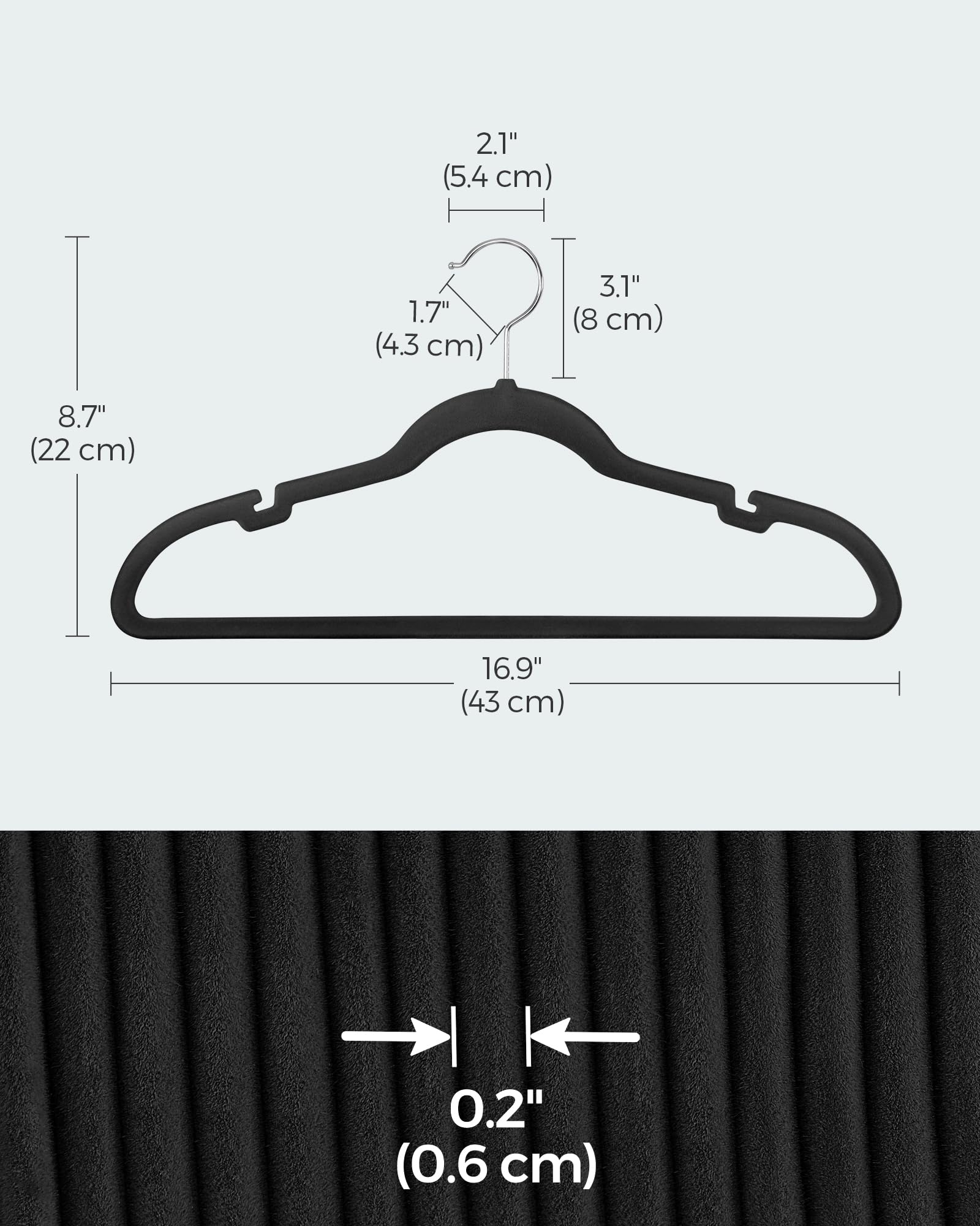 SONGMICS velvet hangers built with pants bar for wrinkle-free trousers.