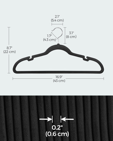 SONGMICS velvet hangers built with pants bar for wrinkle-free trousers.