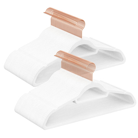 Songmics velvet hangers with rose-gold hook for organized wardrobe.