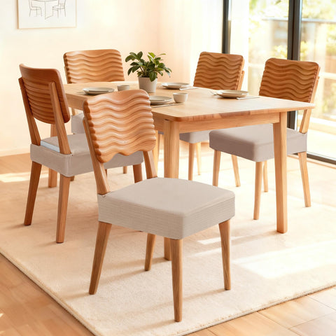 Songrey stretchable chair slipcover in taupe adds soft, wrinkle-resistant comfort.