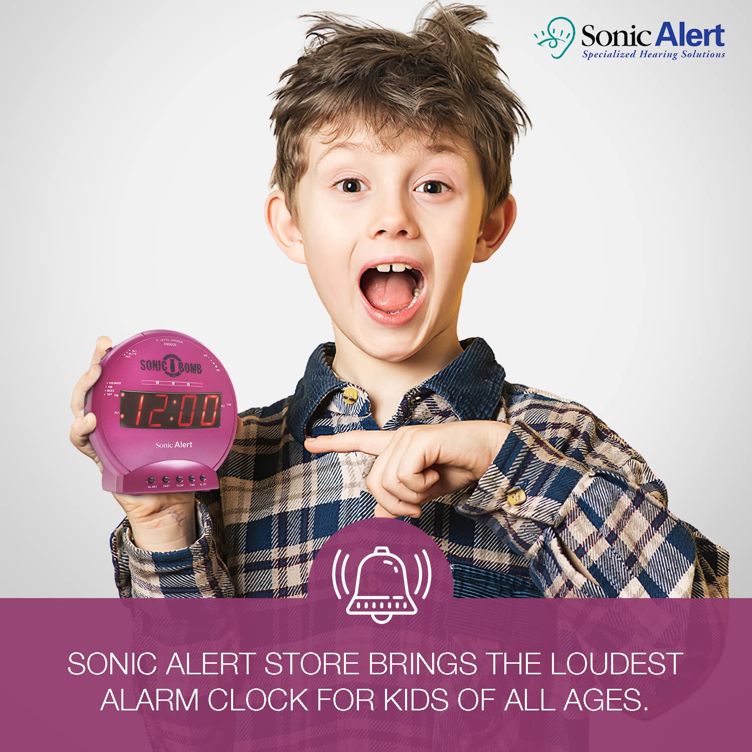Packaging and contents of Sonic Bomb pink alarm clock on white background