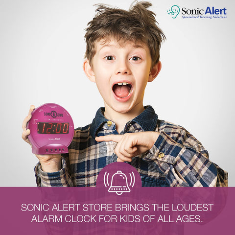 Packaging and contents of Sonic Bomb pink alarm clock on white background
