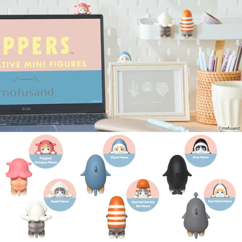 Sonny Angel Hippers mofusand on desktop, attaches to laptop or phone.