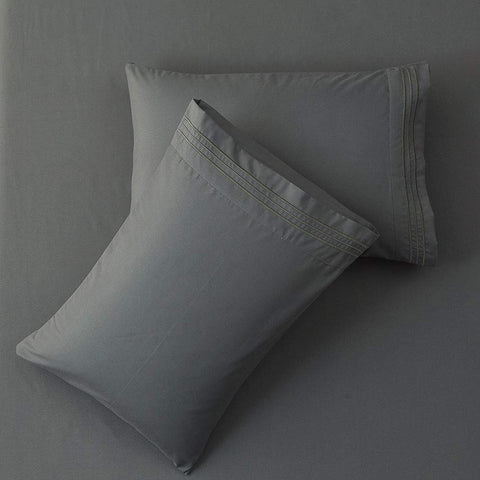 SONORO KATE embroidery detail adds subtle elegance to the sheet set.