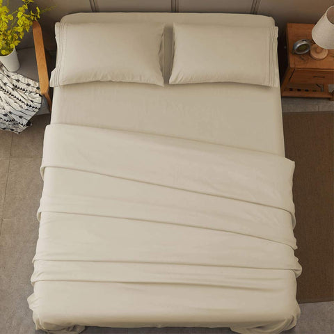 SONORO KATE beige sheets on bed create inviting serene ambiance