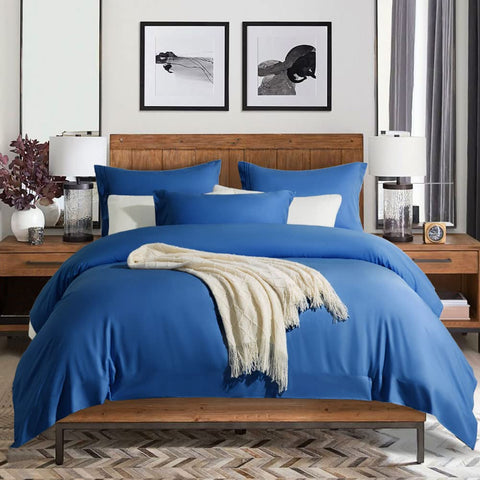 Navy sheets complement modern bedroom decor