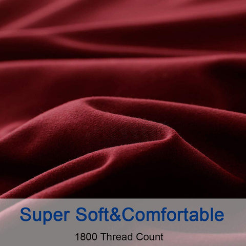 SONORO KATE burgundy embroidery-detail on the bed sheet adds elegant style