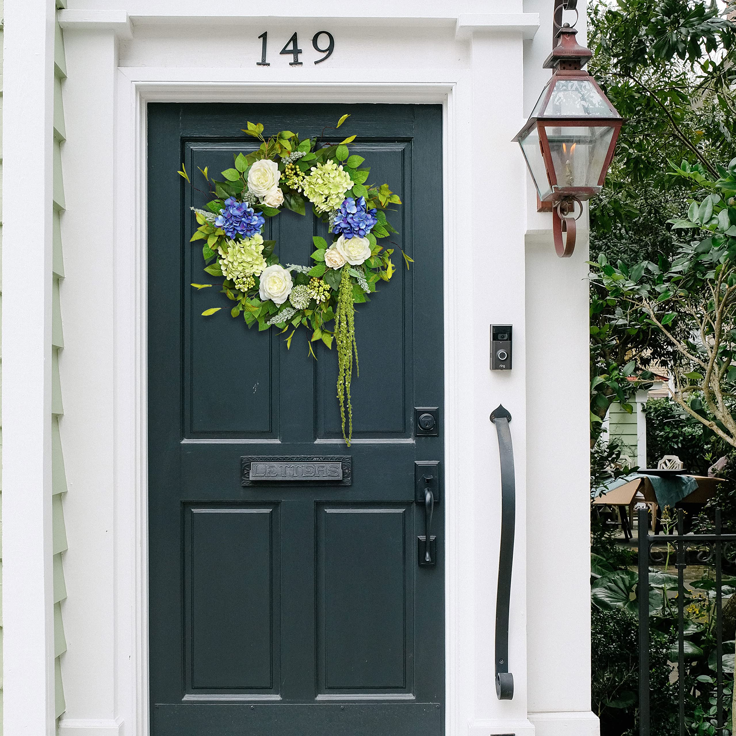Soomeir neutrally-toned wreath highlights silk flowers and swaying vines.
