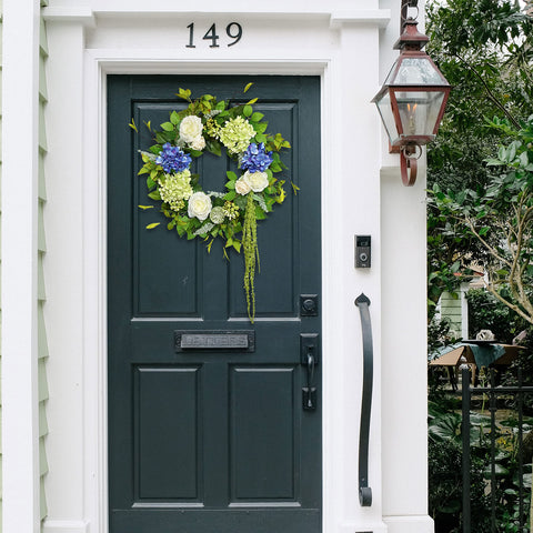 Soomeir neutrally-toned wreath highlights silk flowers and swaying vines.