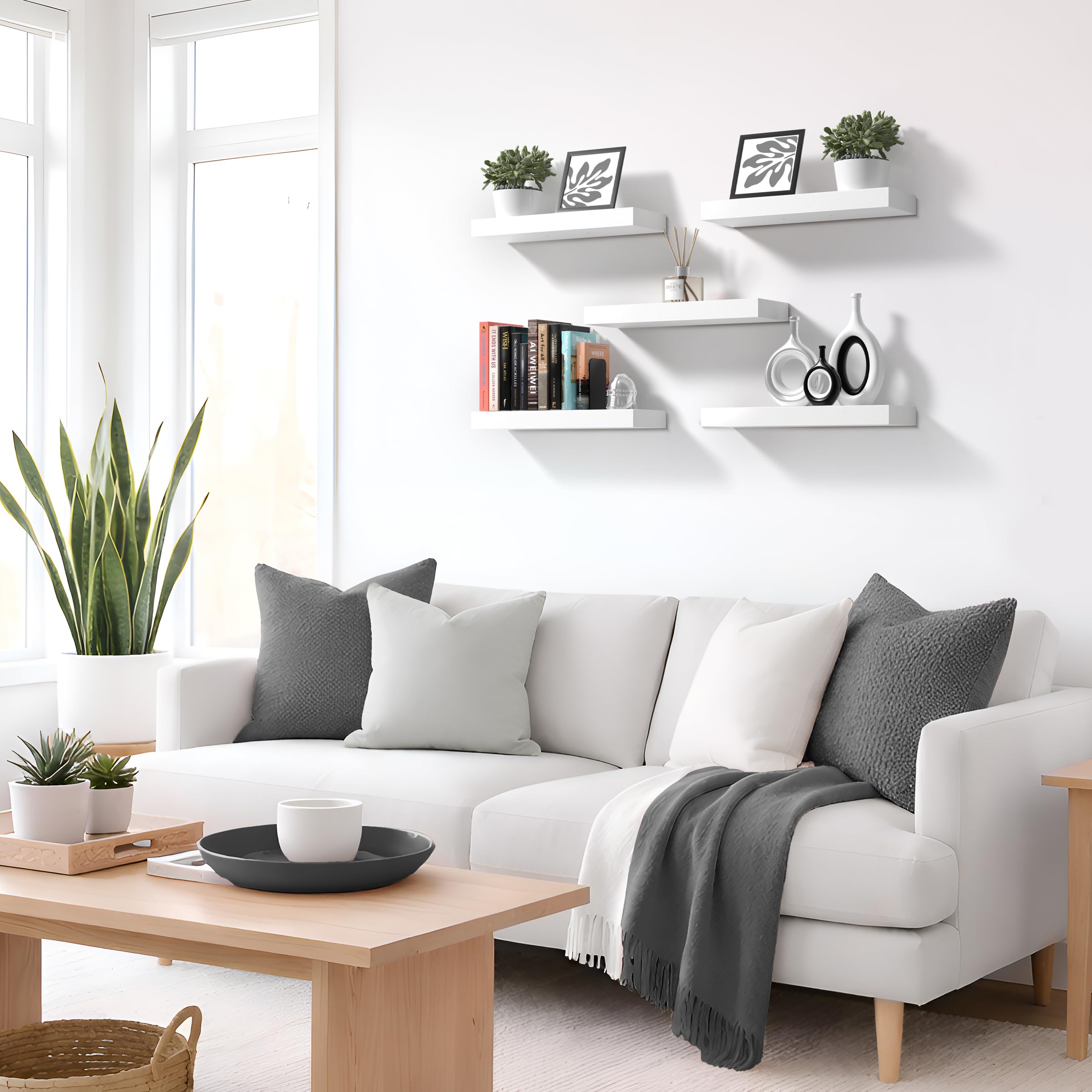 Sorbus floating shelves entryway display white photo frames and small accents.