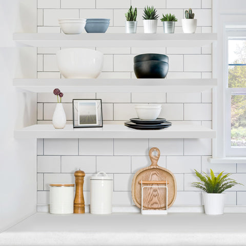 Sorbus kitchen shelf mounted above counter, organizing spices and jars.