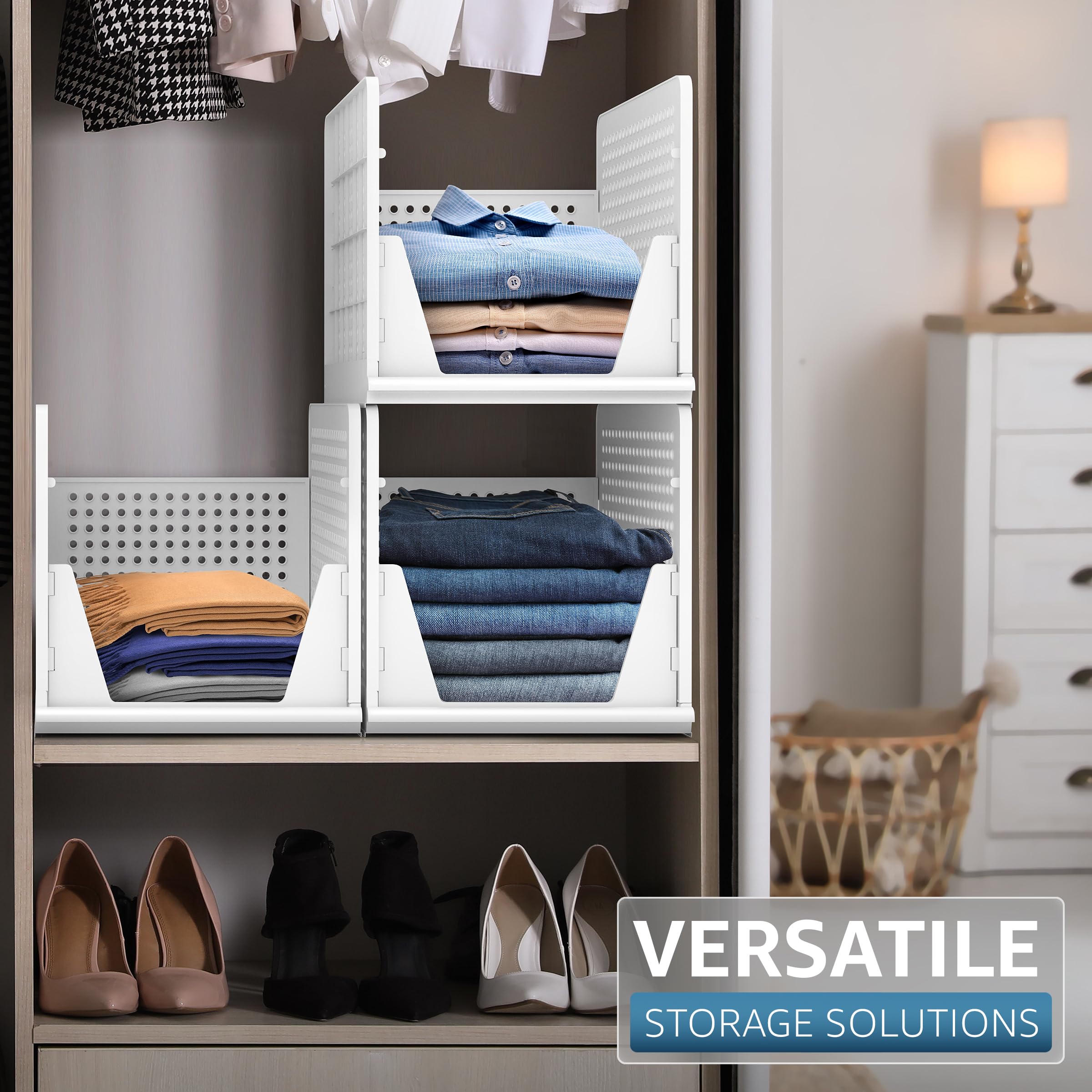 Sorbus stackable baskets in bathroom hold toiletries and towels neatly.