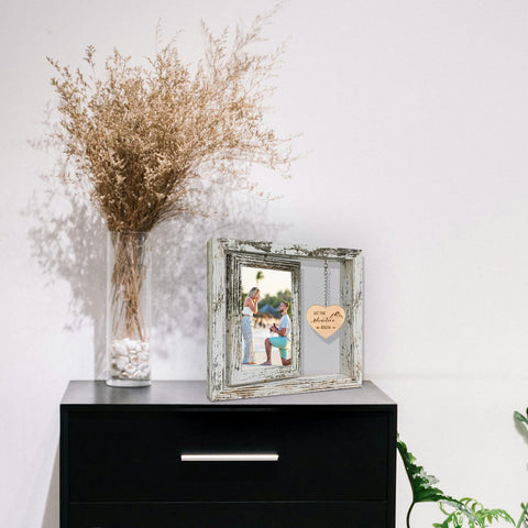 Soruney Distressed white wood finish adds rustic charm to engagement memories.