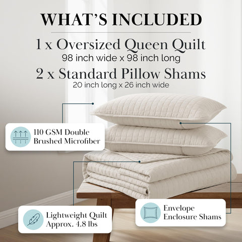Southshore Fine Living quilt set placed on bed showcasing modern decor.