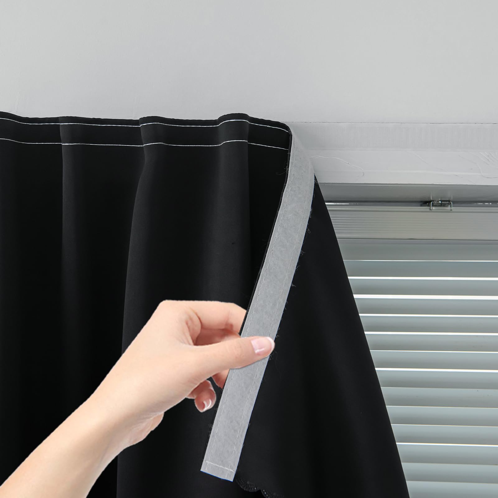Sovtfides adhesive blackout curtain panel ready for peel-and-stick installation in a modern bedroom