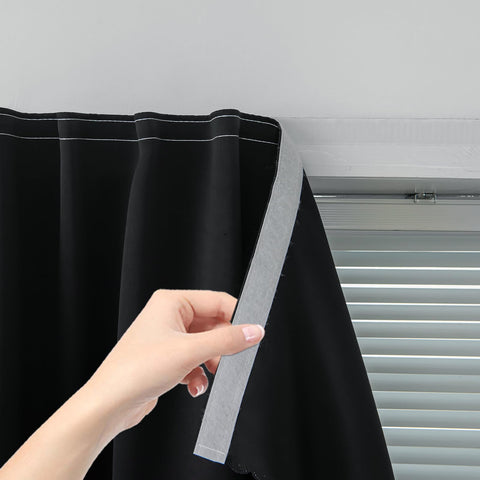 Sovtfides adhesive blackout curtain panel ready for peel-and-stick installation in a modern bedroom